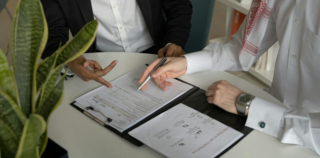 Business professional reviewing supplier documents