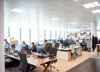 Employees working in a modern open-plan office